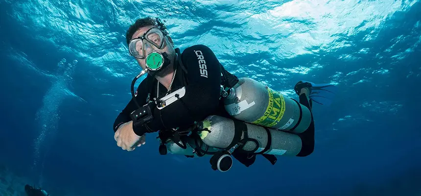 Sidemount diver underwater